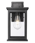 11"H Bowton II Outdoor Wall Light - Dusk to Dawn Matte Black Finish with Glass Shade by Millennium Lighting